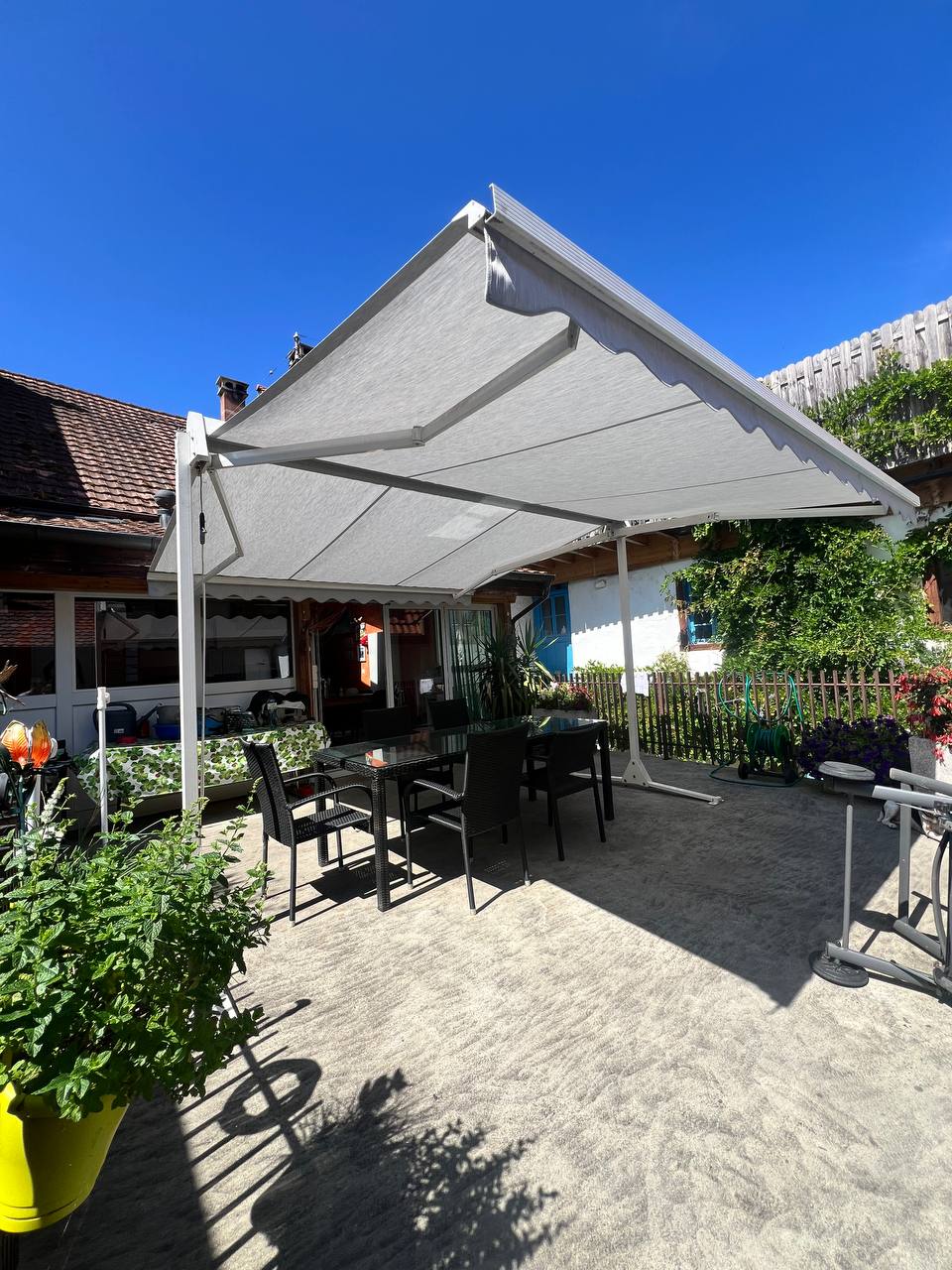 Banne double pente terrasse